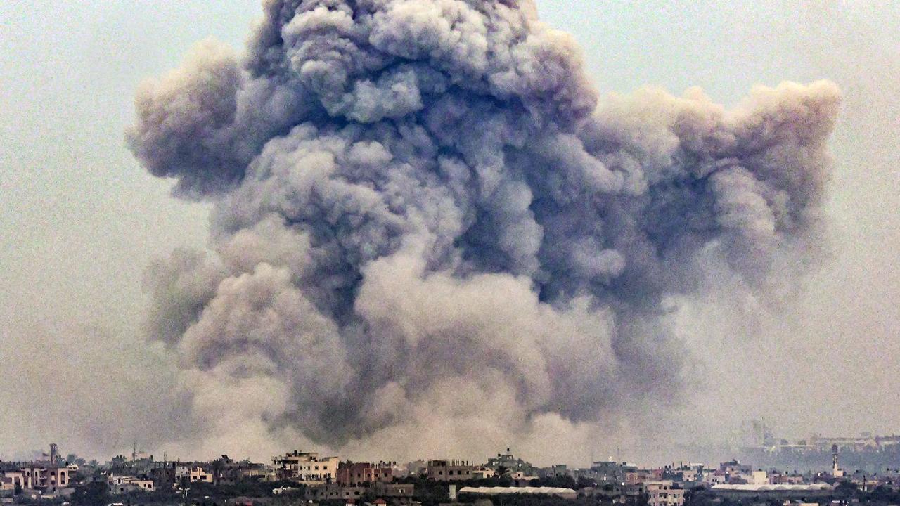 Smoke billows over Khan Yunis from Rafah in the southern Gaza strip. Picture: Said Khatib / AFP