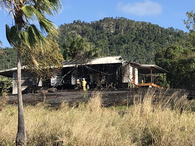 Paramedics, police and firefighters were all called to the fire at a two-storey house in Wills Ct at 2.20pm. Picture: Elyse Wurm