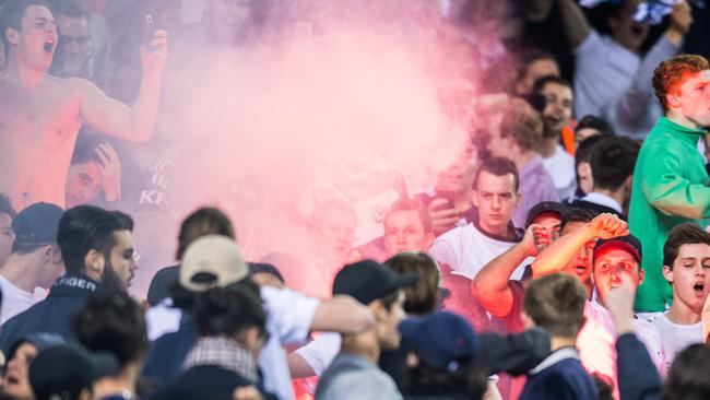 A flare is let off in the crowd in the wake of Marco Rojas' goal. Picture Stuart Walmsley