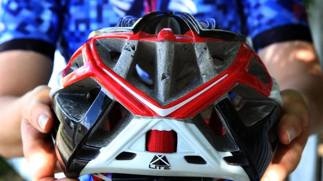 Cyclist Kristina Bannister was left with beak holes and claw marks to the stuffing of her helmet after the worst magpie attack she's ever had. Photo By Patria Jannides