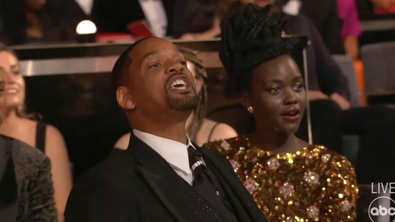 Will Smith, visibly emotional, walked back to his seat in the audience and shouted: 'Keep my wife's name out of your f***ing mouth' to Chris Rock after slapping him on stage. Picture: ABC