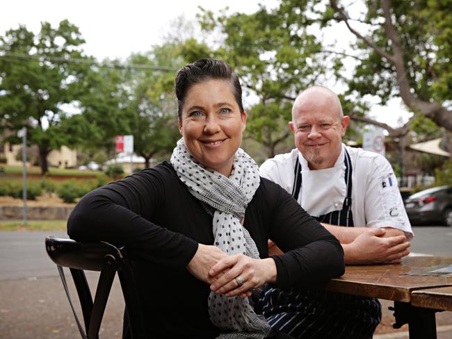 Hilary and Stewart Wallace in the outdoor dining area of the cafe, which overlooks Wahroonga Park. Pictures: Adam Yip