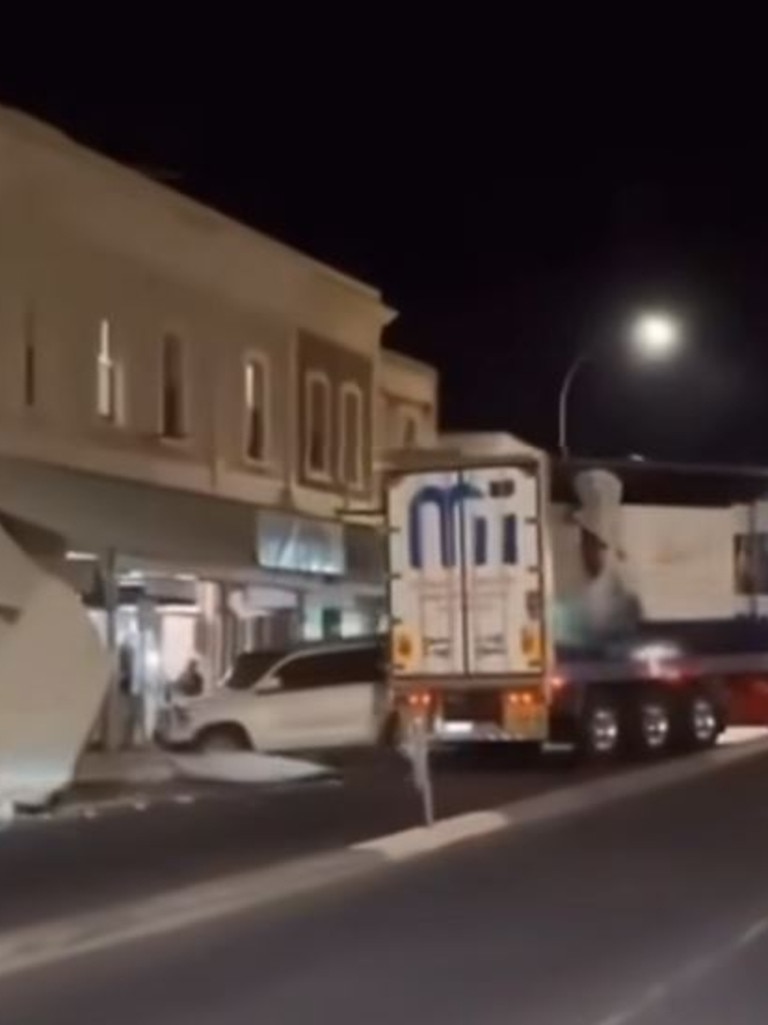 A truck has been captured scraping into a building and two parked cars in the main street of Gawler late on Friday night. Picture: Facebook/Drillin’ Panagiotou