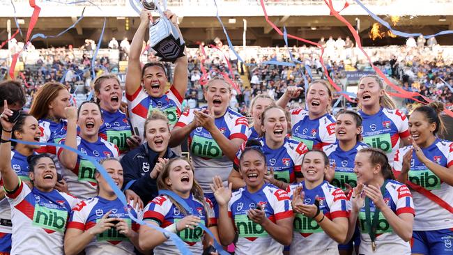 SYDNEY, AUSTRALIA - OCTOBER 02: The Knights celebrate with the NRLW Premiership Trophy after victory in the 2022 NRLW Grand Final match between Newcastle Knights and Parramatta Eels at Accor Stadium, on October 02, 2022, in Sydney, Australia. (Photo by Cameron Spencer/Getty Images)