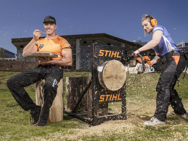 Brad DeLosa (L) and Maddison Kirley (R) pose for a photo, as STIHL Timbersports - The Original Extreme Sport - team up with Albert Park Golf Course and Greenfields to bring the Timber & Tucker Festival, from 6th - 8th October. Albert Park Golf Course, Albert Park, Melbourne, Victoria. Monday October 2nd 2017. Photo: Daniel Pockett