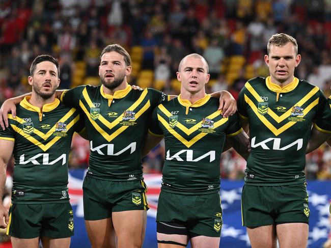 BRISBANE, AUSTRALIA - OCTOBER 18: The Australian players embrace during the men's 2024 Pacific Championships match between Australia Kangaroos and Tonga at Suncorp Stadium on October 18, 2024 in Brisbane, Australia. (Photo by Bradley Kanaris/Getty Images)