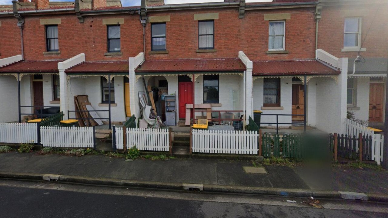 Ms Woodcock owns a row of six terrace houses .