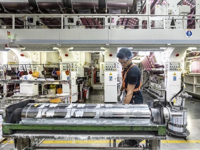 An operator sets up a printing machine inside an Amcor Ltd. packaging plant in Lugo di Vicenza, Italy, on Thursday, Sept. 13, 2018. Australia's Amcor agreed to acquire U.S. competitor Bemis Co. in an all-stock deal to expand sales of plastic packaging in the Americas. Photographer: Alberto Bernasconi/Bloomberg via Getty Images