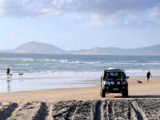 DOLLAR SIGNS: Beach fees for Rainbow Beach residents are back on the agenda, according to Member for Gympie Tony Perrett (right). Picture: Craig Warhurst