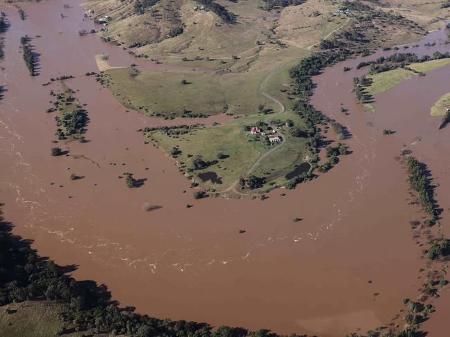 MAITLAND, AUSTRALIA - JULY 08:  Flooding is shown by helicopter on a tour of the Hunter Region by NSW Premier Dominic Perrottet and Emergency Services and Resilience and Minister for Flood Recovery Steph Cooke on July 08, 2022 around Maitland, Australia. Floodwaters have inundated the region following days of storms and heavy rains.  (Photo by David Swift-Pool/Getty Images)