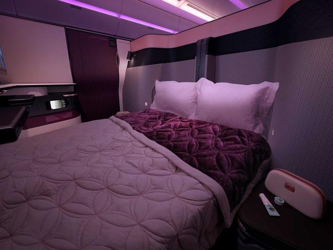 Double bed in QSuite, business class on Qatar Airways.