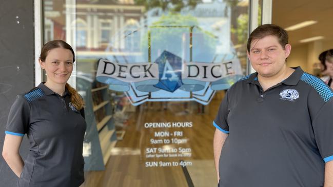 Co-owners Tylah Joy, Josh Berger, and Stuart Joy (not pictured) decided to open DeckADice to give the Mackay region's gaming community a place to play. Photo: Zoe Devenport