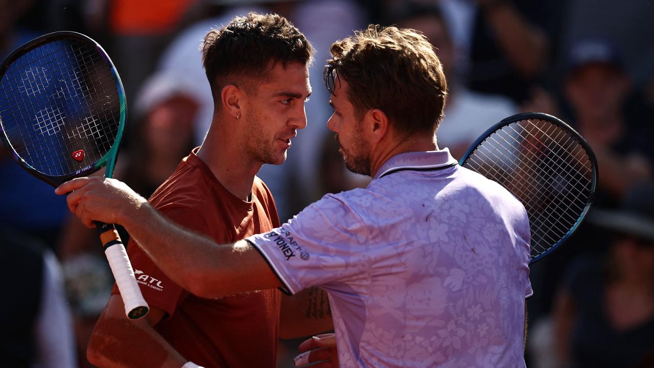 ‘He’s a legend’: Grudge match ends in classy embrace as infamous Kyrgios sledge buried