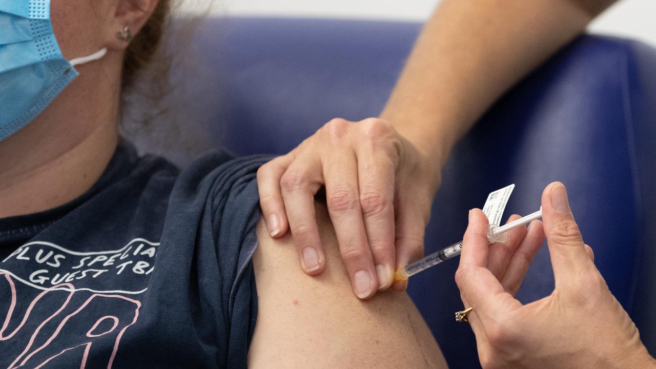 A nurse administers the AstraZeneca COVID-19 vaccine to a patient at the Austin Hospital on March 17 in Melbourne.