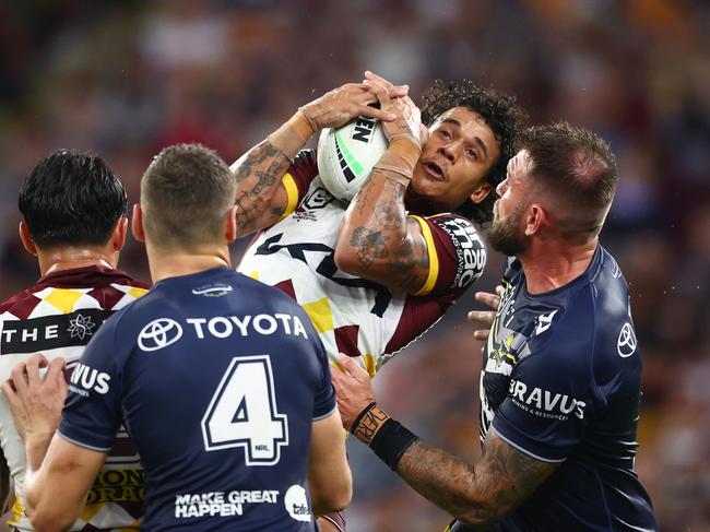 Tristan Sailor soars above the pack for this grab in the Broncos’ win against the Cowboys. Picture: Getty Images