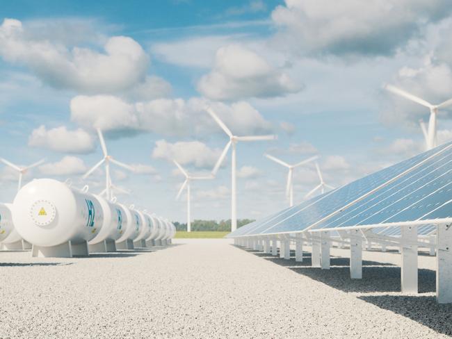 Modern hydrogen energy storage system accompaind by large solar power plant and wind turbine park in sunny summer afteroon light with blue sky and scattered clouds. 3d rendering.