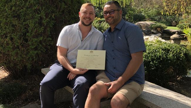 Correctional services officer Stewart Iain Berry, left, and his husband Mathew Campbell, right, on their wedding day. Both are charged with being part of HIV positive pedophile Jadd William Brooker's online child abuse ring. Picture: Supplied.