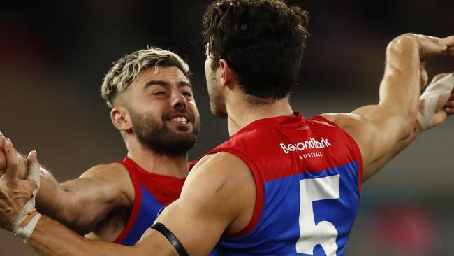 MELBOURNE, AUSTRALIA - JUNE 26: Christian Petracca of the Demons celebrates a goal  during the round 15 AFL match between the Essendon Bombers and the Melbourne Demons at Melbourne Cricket Ground on June 26, 2021 in Melbourne, Australia. (Photo by Darrian Traynor/AFL Photos/via Getty Images )