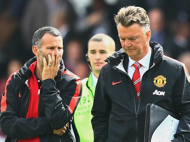 BURNLEY, ENGLAND - AUGUST 30: Assistant Ryan Giggs of Manchester United talks to Manager Louis van Gaal of Manchester United at the end of the Barclays Premier League match between Burnley and Manchester United at Turf Moor on August 30, 2014 in Burnley, England. (Photo by Mark Thompson/Getty Images)