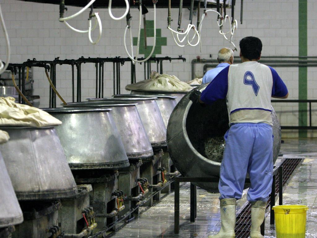 A prisoner works in the kitchen inside Evin prison. Picture: Vahid Salemi/AP