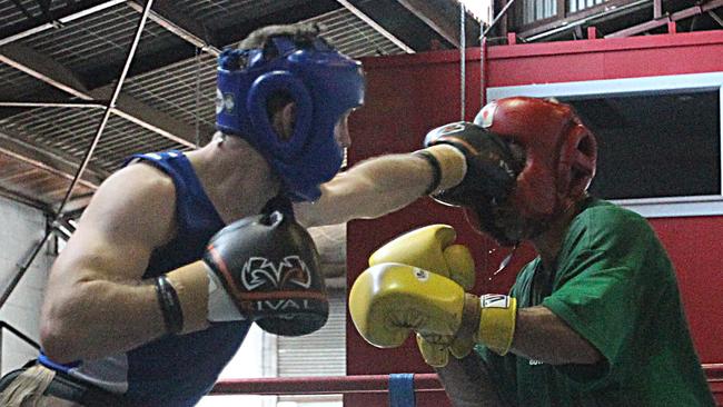 Jeff Horn lands a shot on Anthony Mundine during their sparring session in 2013. Picture: Annette Dew