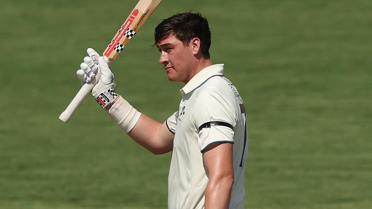 Matt Renshaw raises the bat after scoring a ton for the Prime Ministers XI against Pakistan in Canberra. Picture: Mark Metcalfe/Getty Images