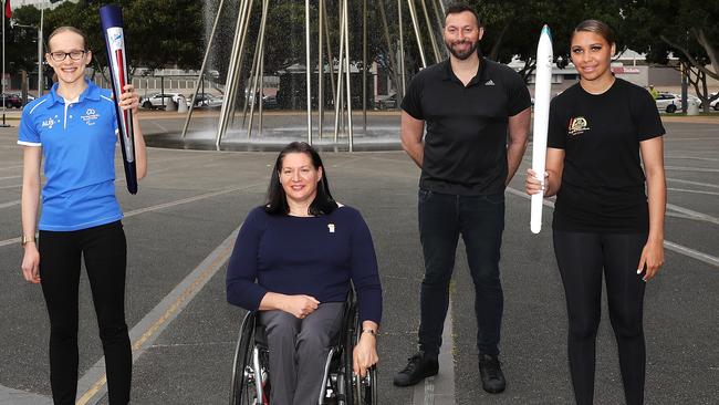 Tamsin Colley, Louise Sauvage, Ian Thorpe and Tenayah Logan after the relighting. Picture: Mark Kolbe