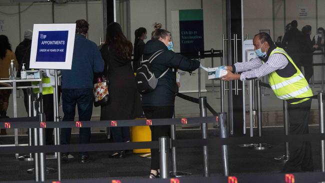 Some people waited for as long as six hours to get the jab amid Saturday’s chaos. Picture: Tony Gough