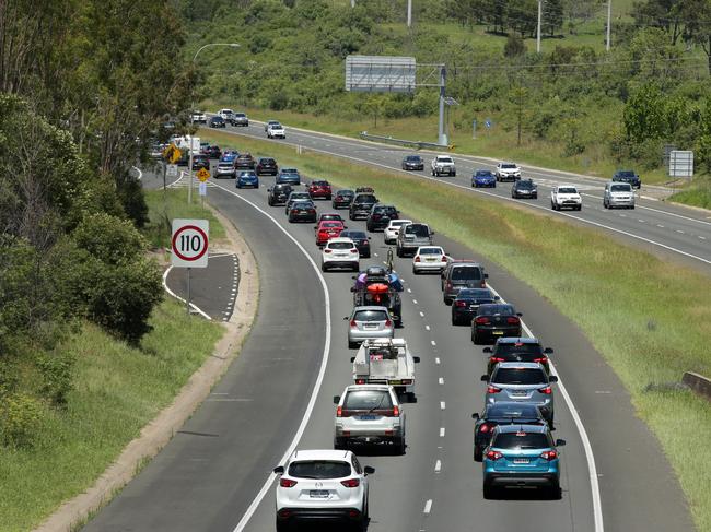 Slow Boxing Day traffic on the Hume Motorway at Campbelltown as people head south out of Sydney. Picture: Jonathan Ng