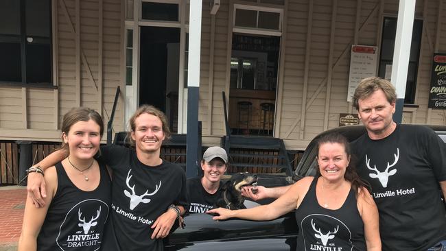 Mekayla Burdfield, Nathan Squire, Josh Squire, Buster the dog, Leah and Paul Squire, out the front of the Linville Hotel. (Picture: Marguerite Cuddihy)