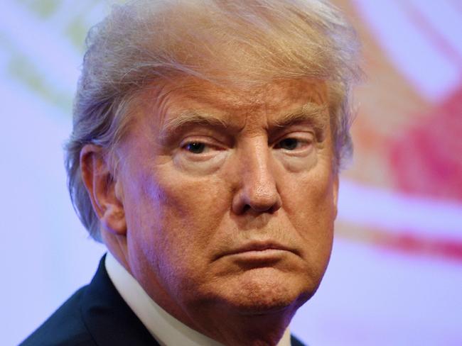 U.S. President Donald Trump arrive for a family photo during the ASEAN-U.S. 40th Anniversary commemorative Summit in Manila, Philippines, Monday, Nov. 13, 2017. (Manan Vatsyayana/Pool Photo via AP)