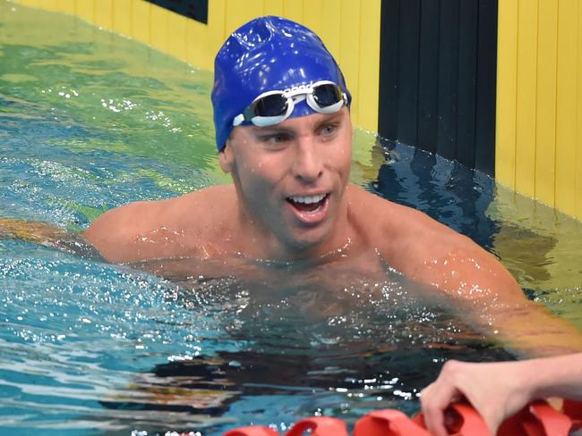 (FILES)-- This file photo taken on April 3, 2015 shows dual Olympic champion Grant Hackett smiles after finishing third in the 400-metres freestyle final in his comeback swim after seven years out of the pool at Australia's world championship trials in Sydney.  Grant Hackett plans to quit drinking after a recent meltdown on a plane, admitting to a "deep sense of shame" with his reputation tarnished. / AFP PHOTO / PETER PARKS / --IMAGE RESTRICTED TO EDITORIAL USE - STRICTLY NO COMMERCIAL USE--