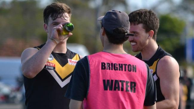 A Brighton Football Club player and water boy have been suspended one week each by the Adelaide Footy League for drinking a beer on the field during a match. Picture: Supplied.