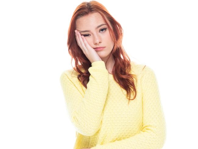 CAREERS: Cute young female wearing a yellow sweater and light blue jeans