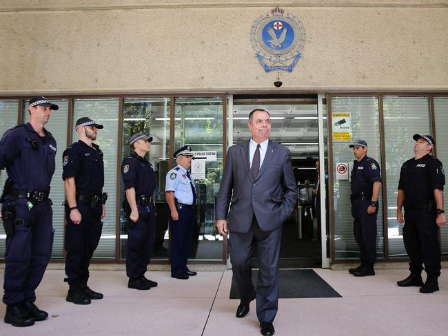 NSW Police deputy commissioner Nick Kaldas walks through a guard of honour ahead of his announcement. Picture: Craig Greenhill