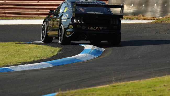 David Reynolds throws his #26 Penrite Racing Ford Mustang during race three at Sandown.