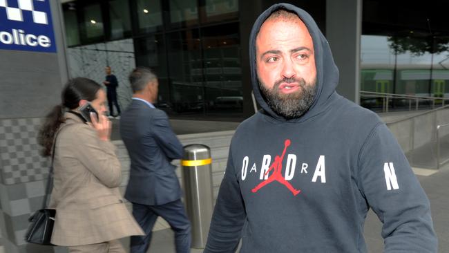 Nabil Maghnie outside Melbourne West police station after being questioned by detectives. Picture: Andrew Henshaw