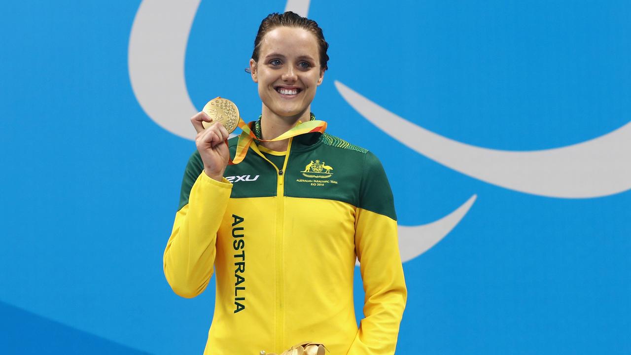 Ellie Cole poses with her gold medal from the 100m backstroke at the 2016 Rio Paralympic Games. Picture: Getty Images