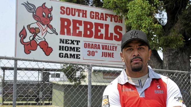 South Grafton Rebels new coach Roy Bell in front of the Rebels sign at McKittrick Park. Picture: Mitchell Keenan