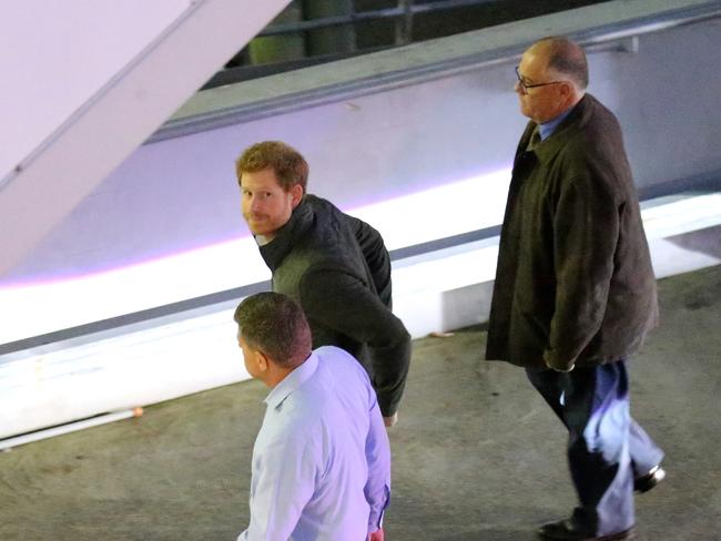 Prince Harry departing from Sydney International Airport. Picture: Stephen Cooper