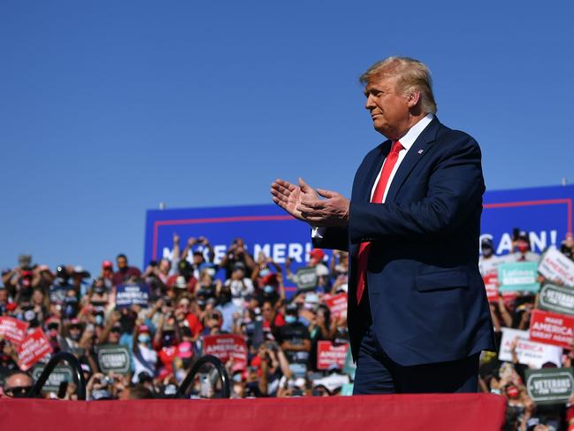 US President Donald Trump greets his supporters during a campaign stop in Arizona. Picture: AFP