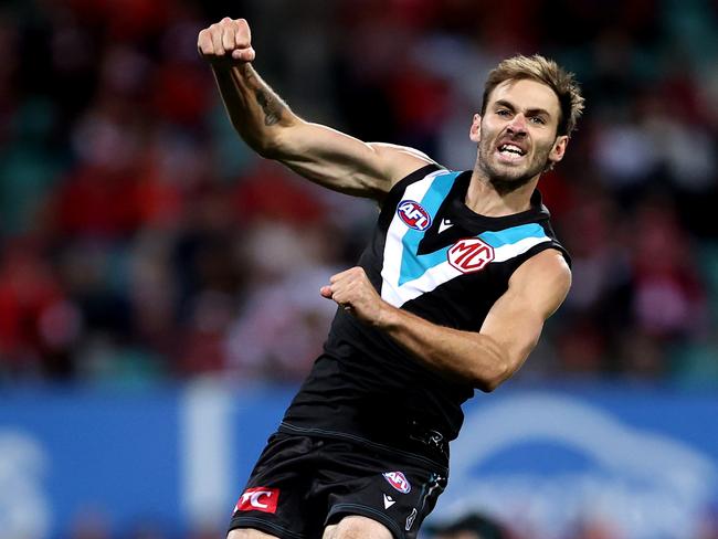 SYDNEY, AUSTRALIA - APRIL 08: Jeremy Finlayson of Port Adelaide celebrates kicking a goal during the round four AFL match between Sydney Swans and Port Adelaide Power at Sydney Cricket Ground, on April 08, 2023, in Sydney, Australia. (Photo by Brendon Thorne/AFL Photos/via Getty Images )