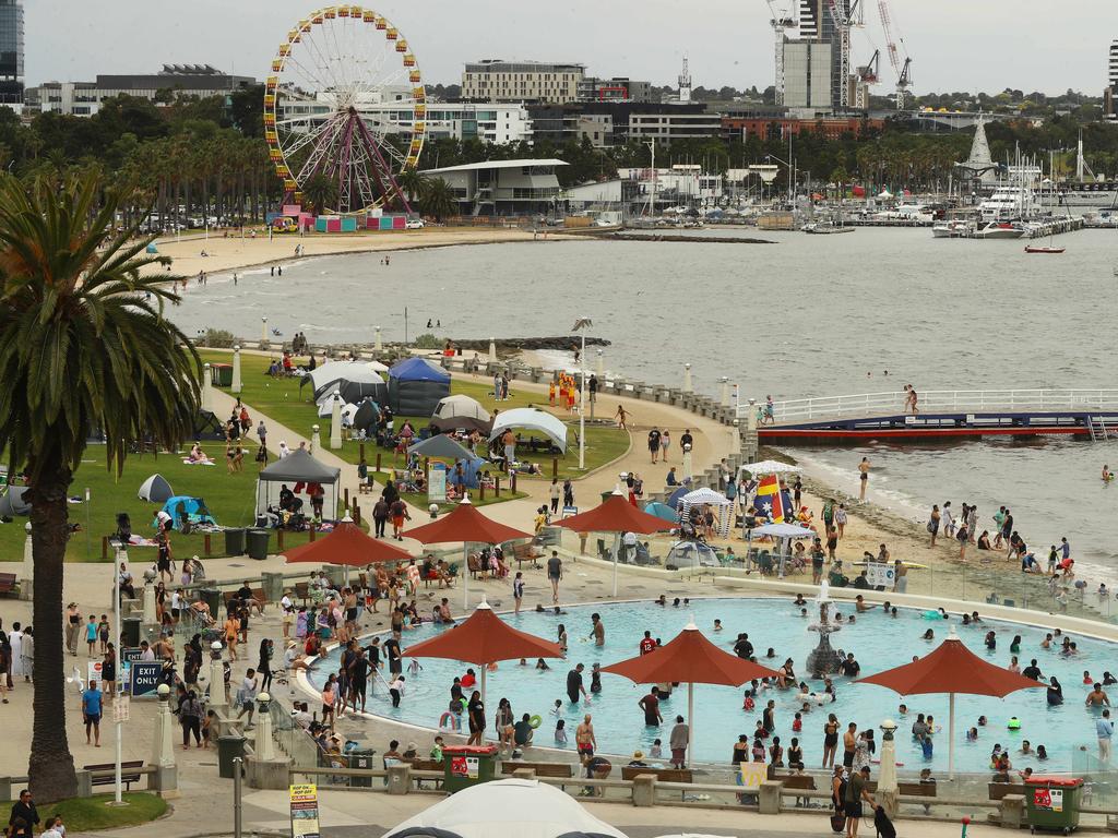 Beach goers cooling off on Boxing Day 2024 at Geelong's Waterfront. Picture: Alison Wynd