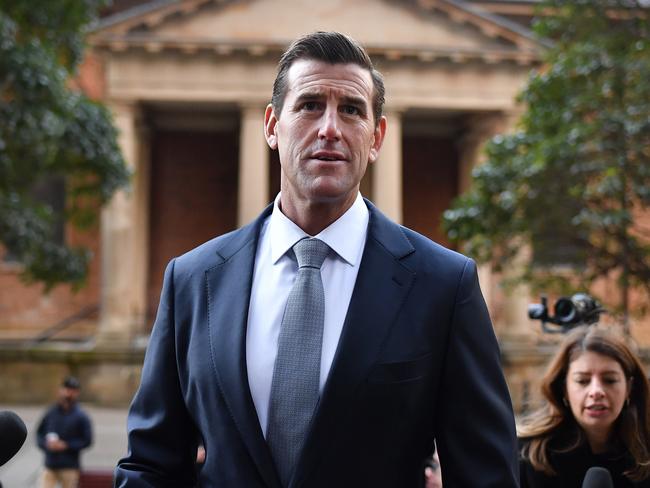 SYDNEY, AUSTRALIA - JUNE 07: Ben Roberts-Smith arrives at the Federal Court of Australia in Sydney on June 07, 2021 in Sydney, Australia. Ben Roberts-Smith is suing three Fairfax newspapers for defamation over reports he committed war crimes while serving in the Australian Special Air Services in Afghanistan. Ben Roberts-Smith is Australia's most decorated living soldier and a Victoria Cross recipient. (Photo by Sam Mooy/Getty Images)