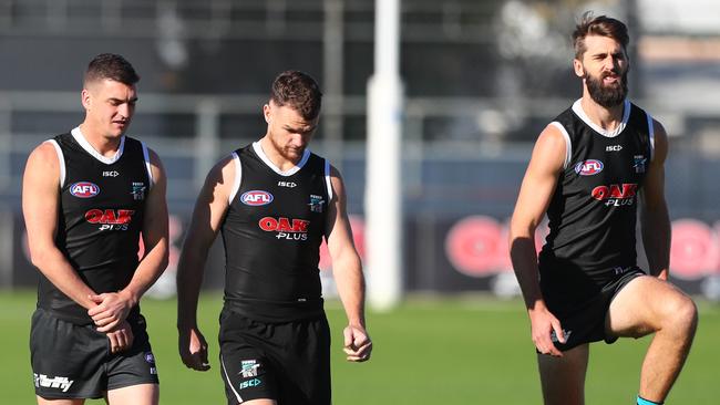 Tom Rockcliff, Robbie Gray and Justin Westhoff at Port training at Alberton Oval. Picture: Tait Schmaal