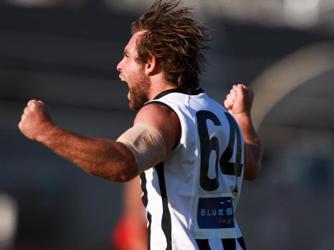 Ricky Ferraro celebrates a goal for Collingwood’s VFL side.