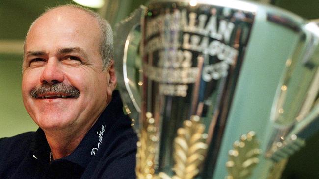 Leigh Matthews with the premiership cup.