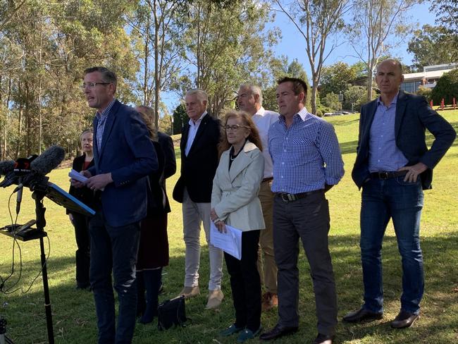 The flood report is handed down publicly at Lismore. Pictured: Premier Dominic Perrottet, deputy premier Paul Toole, David Witherdin, Michael Fuller, Mary O’Kane, Tamara Smith, Janelle Saffin, Geoff Provest and Chris Gulaptis.