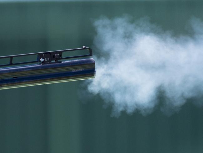 A shot is fired at the Clay Target Shooting Range, Gladstone.Photo Luka Kauzlaric / The Observer