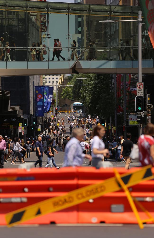 Barricades are used to block streets around Pitt Street Mall, George Street and Elizabeth Streets during the Boxing Day sales in the Sydney CBD. Picture: AAP